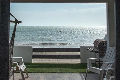 Oceanfront ground level condo on a Private Beach in a lovely resort!
