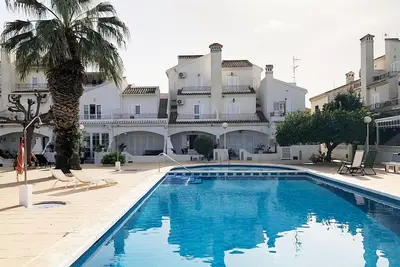 Image de Charmante maison de vacances avec piscine communautaire