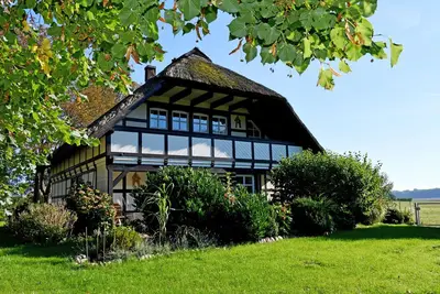 Image de Thatched-roof villa on Wiesengrund - duplex apartment on the upper floor