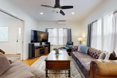 Image de Relaxing river-view home with private patio, grill, covered balcony, & W/D