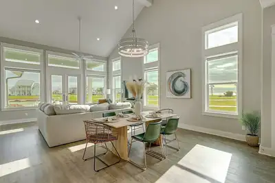 Image de Modern bayfront home with private dock & access to a pool & firepit