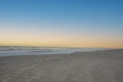 Image de Surfside Christmas Bay access, walk to beach & backyard fishing