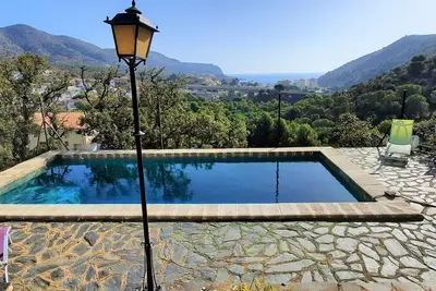Image de Appartement Ă Colera avec Terrasse et Piscine Commune