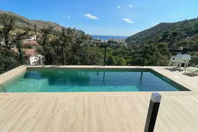 Image de Appartement avec Terrasse Panoramique et Piscine Commune Ă Colera