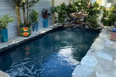 Image de 4Bed Spacious Home w/cocktail pool Minutes 2 dtwn St Pete!