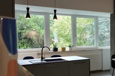 Image de Apartment with kitchen-living room, 3 bedrooms, 2 bathrooms, laundry.