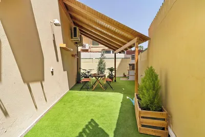Image de Maison à Maspalomas 'Colina Verde' avec terrasse privée, barbecue, Wi-Fi et climatisation