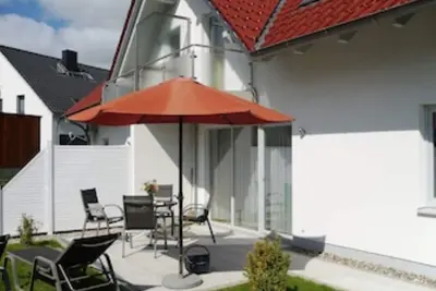 Image de 120 meters to the lake - vacation apartment with top equipment