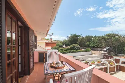 Image de Maison de vacances \"Villetta sul Mare\" avec vue sur la mer, jardin et balcon.
