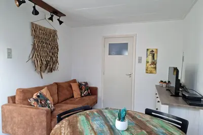 Image de Cozy holiday home, situated around the corner of the beach, sea and dunes!