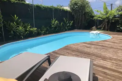 Image de Cocon Douillet Avec Piscine, spacieux appartement de trois chambres climatisées