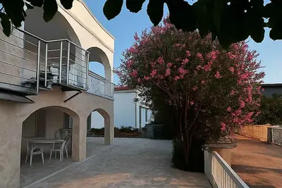 Image de Appartement de vacances avec air conditionné et vue sur la mer