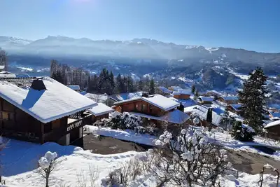 Image de Bel appartement exposé Sud 68m2 face aux montagnes avec vue sur le Grand Massif