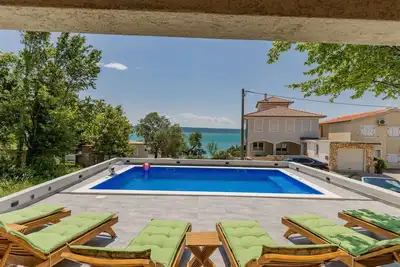 Image de Confortable appartement pour 4 personnes avec climatisation, Wifi, piscine, Tv, patio et parking