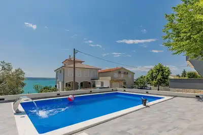 Image de Joli appartement pour 4 personnes avec climatisation, Wifi, piscine, Tv, patio et parking
