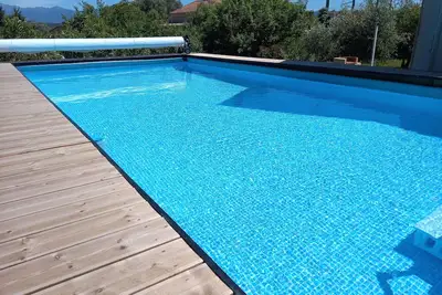 Image de U Mandarinu rez-de-villa avec piscine commune