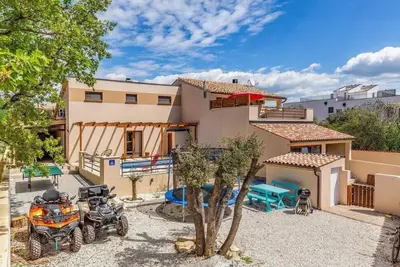 Image de Maison de vacances Barbariga pour 1 - 6 personnes avec 3 chambres à coucher - Maison de vacances