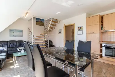 Image de High-quality top floor apartment directly on the dyke for 4 people with sea view