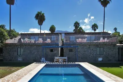 Semi-detached holiday home with pool and sea views