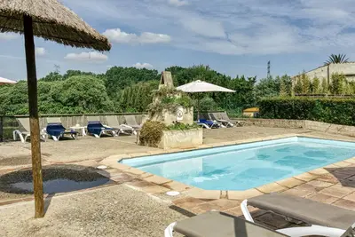 Image de Maison de campagne 'Can Gat Vell' avec piscine partagée, Wi-Fi et climatisation