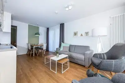 Image de Tolles Ferienapartment in Strandnähe mit Süd-ost-terrasse & Saunabereich im Haus