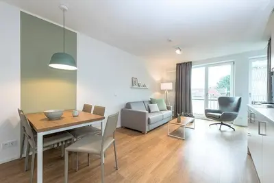 Image de Zentrales Familienapartment in Strandnähe mit Sonniger Loggia & Sauna im Haus!