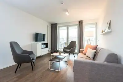 Image de Top Ferienapartment in Strandnähe mit Toller Loggia, Zwei Bädern & Sauna im Haus