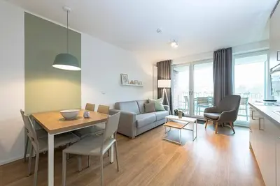 Image de Tolles Ferienapartment in Strandnähe mit Geschützter Loggia und Sauna im Haus!