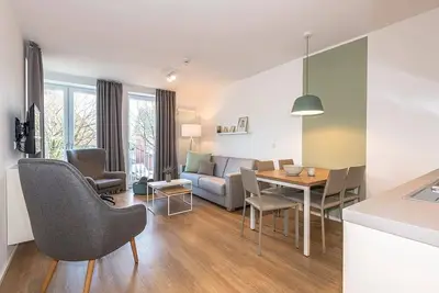 Image de Modernes Apartment in Strandnähe mit Sonniger Süd-ost Loggia und Sauna im Haus!