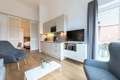 Image de Schickes Familien-apartment in Strandnähe mit Sonniger Loggia und Sauna im Haus!