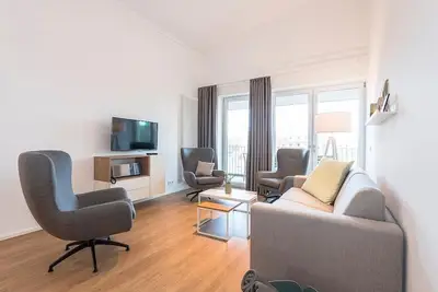 Image de Familien-apartment in Strandnähe mit Großer Loggia, Zwei Bädern & Sauna im Haus!