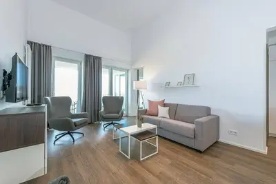 Image de Top Apartment in Strandnähe mit Toller Loggia, Zwei Bädern und Sauna im Haus!