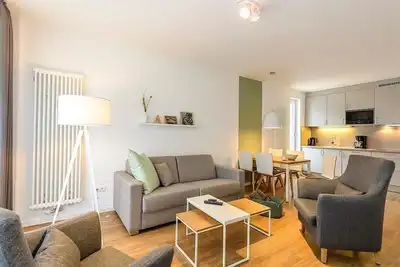 Image de Ferienapartment mit Terrasse Inkl. Freier Nutzung von Saunabereich & Schwimmbad