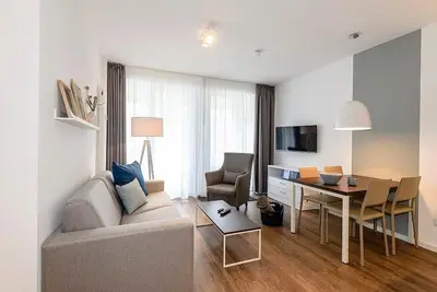 Image de Familienapartment mit Terrasse und Freier Nutzung von Saunabereich & Schwimmbad