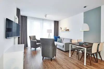 Image de Strandnahes, Modernes Apartment mit Terrasse Inkl. Schwimmbad- & Saunanutzung