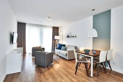 Image de Strandnahes, Schickes Apartment mit Terrasse Inkl. Schwimmbad- & Saunanutzung