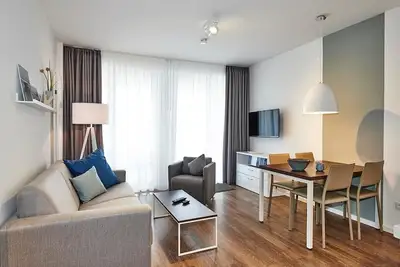 Image de Strandnahes Ferienapartment mit Zwei Terrassen Inkl. Schwimmbad- & Saunanutzung