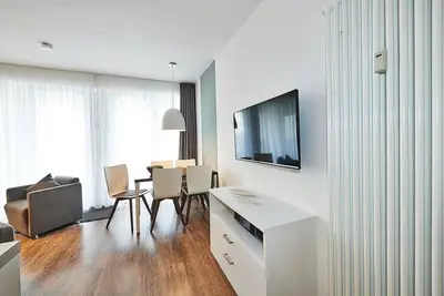 Image de Vacation apartment close to the beach with large balcony incl. use of swimming pool & sauna