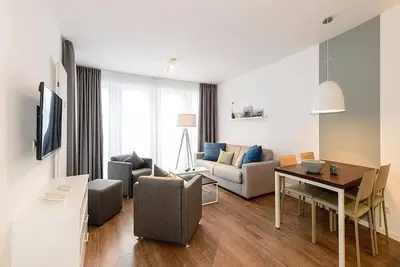 Image de Great vacation apartment with balcony incl. use of swimming pool & sauna near the beach