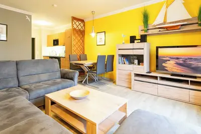 Image de 3-zimmer Ferienwohnung in Bester Strandlage mit Saunabereich in der Anlage