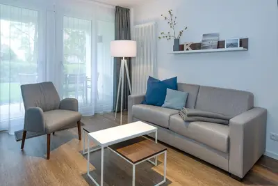 Image de Strandnahes Apartment mit Terrasse Inkl. Parkplatz, Schwimmbad- & Saunanutzung