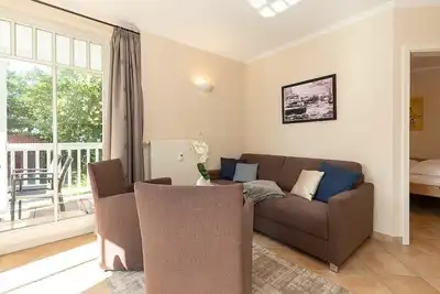 Image de Hübsche Ferienwohnung an der Ostsee mit Balkon, Inkl. Sauna & Pool im Haus!