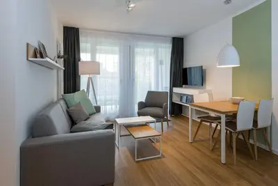 Image de Strandnahes Apartment mit Terrassen Inkl. Parkplatz, Schwimmbad- & Saunanutzung
