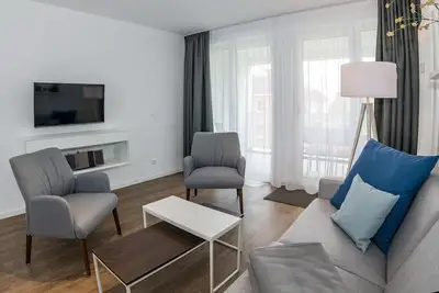 Image de Strandnahes Apartment mit Balkon Inkl. Parkplatz, Schwimmbad- & Saunanutzung