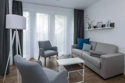 Image de Strandnahes Apartment mit Großem Balkon, Parkplatz, Schwimmbad- & Saunanutzung