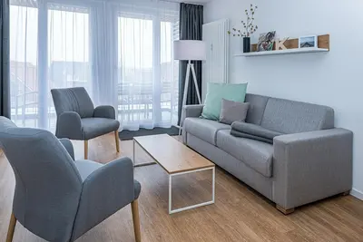 Image de Strandnahes Ferienapartment mit Balkon, Parkplatz, Schwimmbad- & Saunanutzung