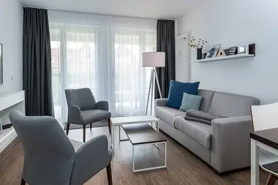 Image de Top-ferienapartment mit Großer Terrasse, Parkplatz, Schwimmbad- & Saunanutzung