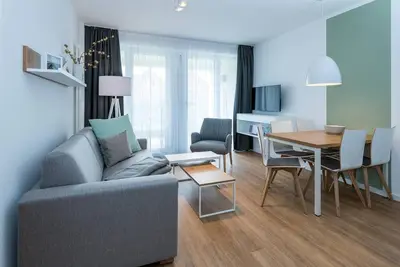 Image de Apartment Nahe der See mit Zwei Terrassen, Parkplatz, Schwimmbad- & Saunanutzung