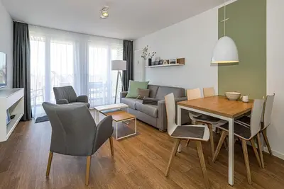Image de Nordseenahes Ferienapartment mit Balkon, Parkplatz, Schwimmbad- & Saunanutzung