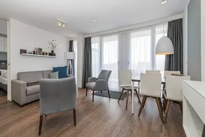 Image de Strandnahes Apartment mit Großem Balkon, Parkplatz, Schwimmbad- & Saunanutzung